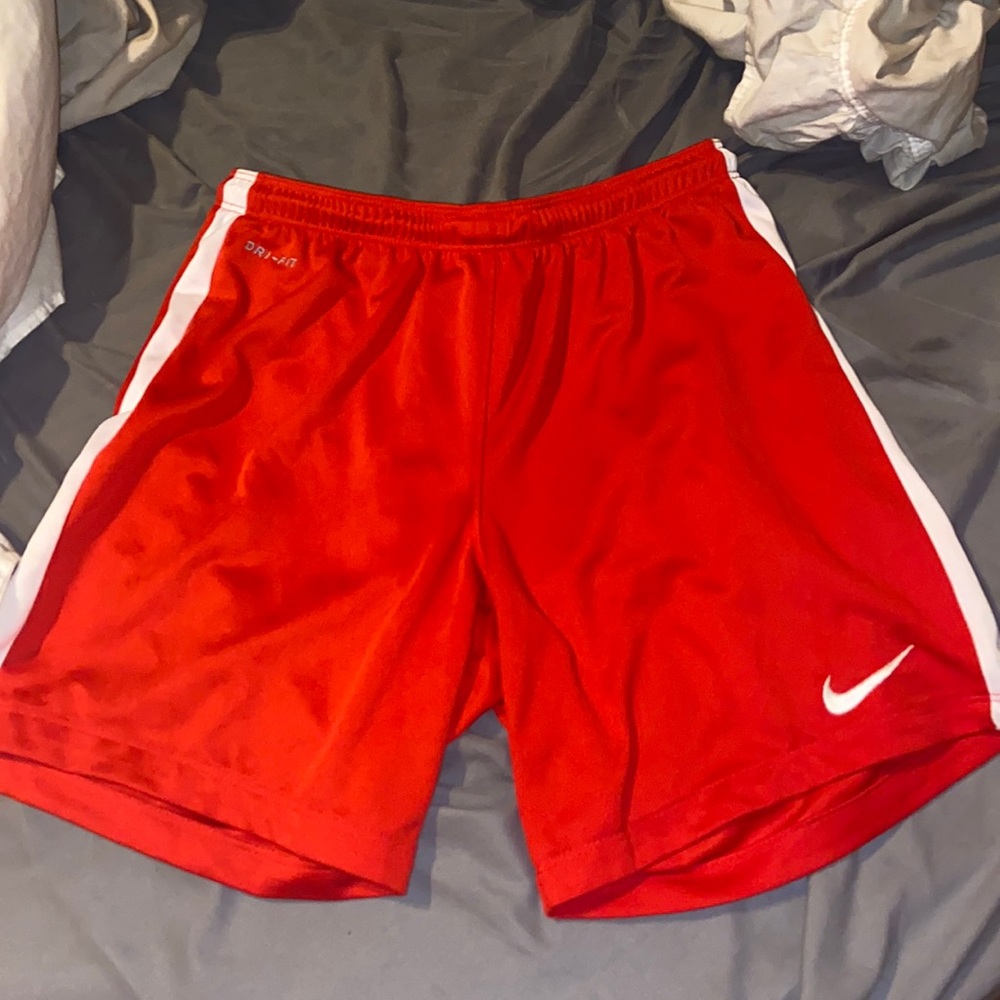 Red Nike shorts